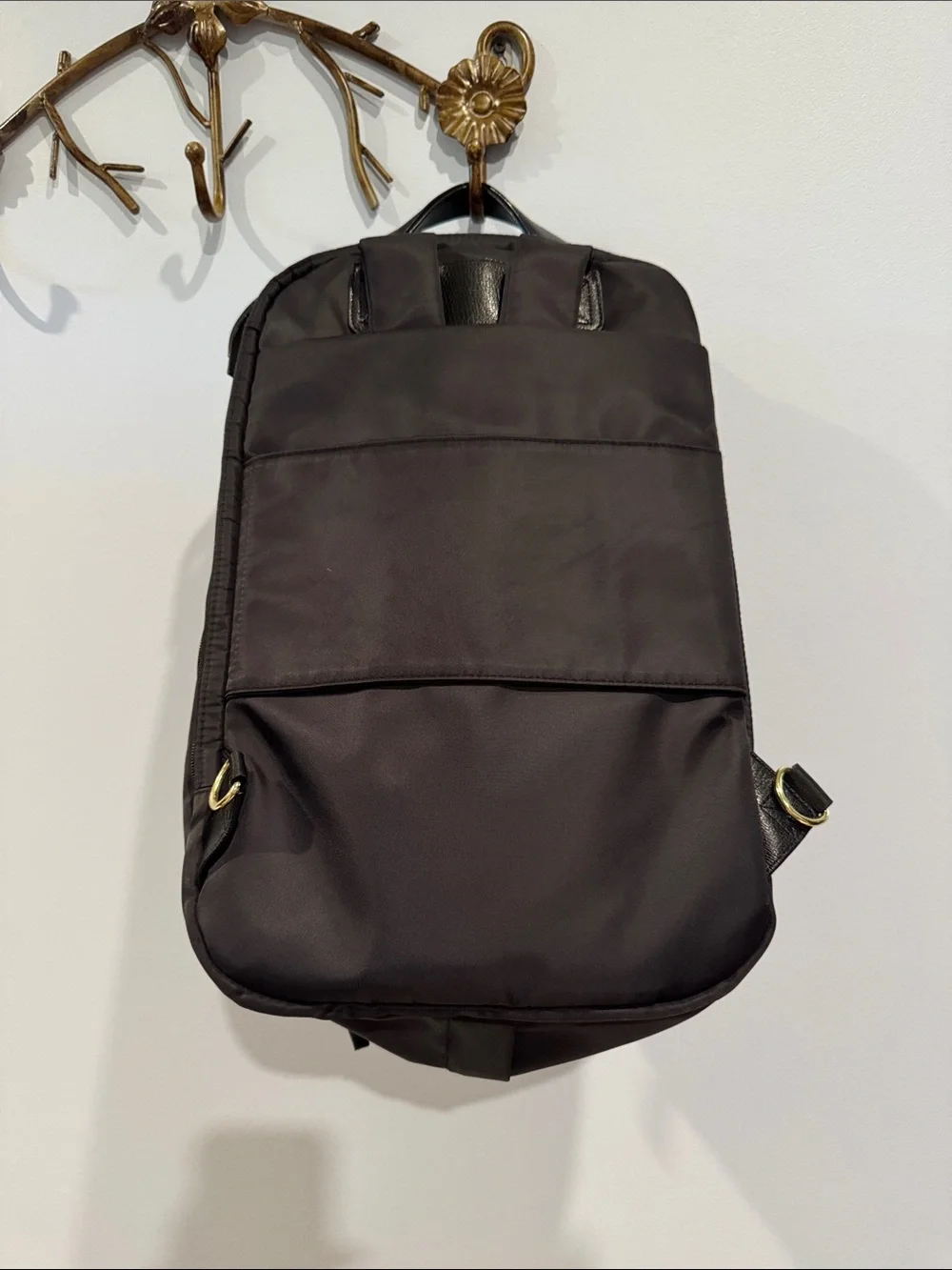 Allancia Peyton black nylon backpack featuring striking gold-tone hardware. NEW